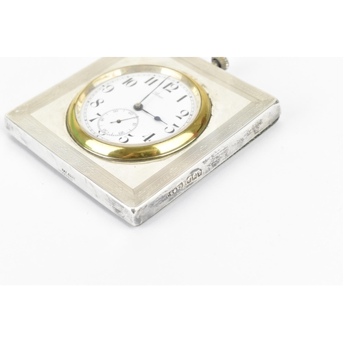 41 - An early 20th century silver cased bedside/travel clock, the winding crown mounted to the top of the... 