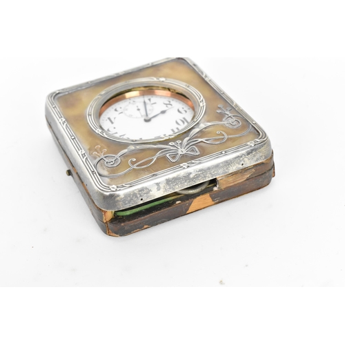 42 - An early 20th century Goliath nickel plated 8 day clock in a fitted silver and leather case, the wat... 