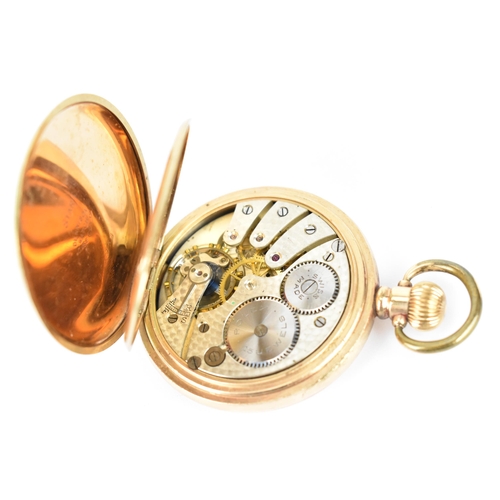 46 - An early 20th century Rolex gold plated, full hunter pocket watch having a white enamel dial with Ro... 