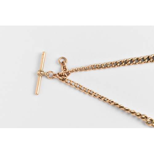 47 - A 9ct rose gold curb link pocket watch chain having a T-bar and two dog clips, 41cm long, 15.7 grams... 