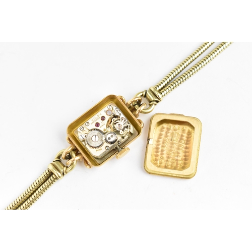 49 - A Rolex manual wind, ladies 18ct gold cased wristwatch having a silvered dial signed Rolex, with gil... 