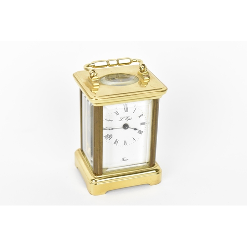 53 - A modern L'Epee brass cased miniature carriage clock, white enamel dial with Roman numerals, the mov... 