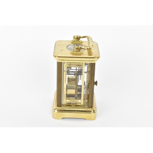 53 - A modern L'Epee brass cased miniature carriage clock, white enamel dial with Roman numerals, the mov... 