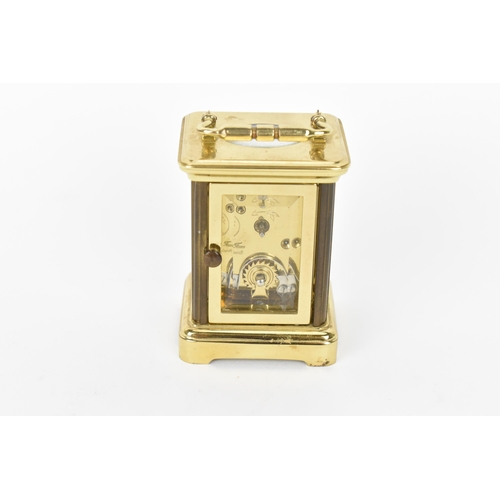 53 - A modern L'Epee brass cased miniature carriage clock, white enamel dial with Roman numerals, the mov... 