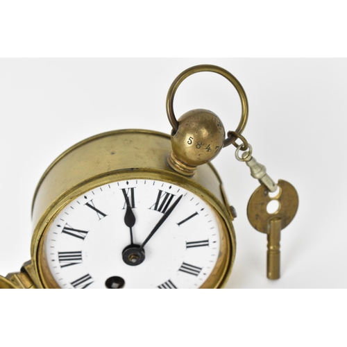 56 - An early/mid 20th century converted watchmans brass cased clock, the white enamel dial having Roman ... 