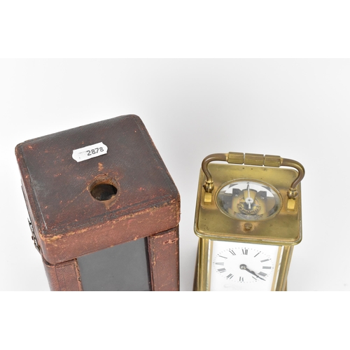 59 - An early 20th century brass cased repeater carriage clock having a white enamel dial with Roman nume... 