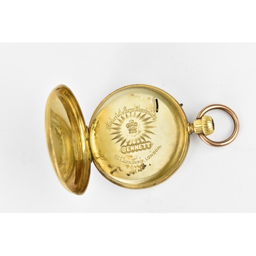 7 - An early 20th century Bennett yellow metal, open faced pocket watch having a white enamel dial A/F, ... 