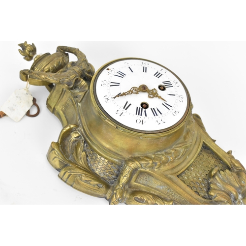 97 - A 19th century French gilt metal Louis XV style wall hanging clock, the case having a torch finial a... 