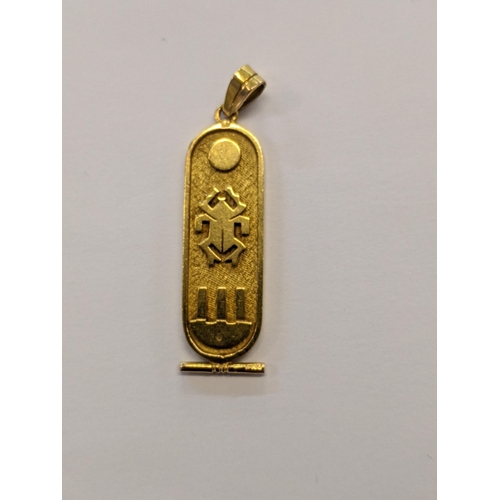 29 - A Egyptian gold pendant decorated with hieroglyphics, tested as 14ct, 8.3g
Location: CAB5