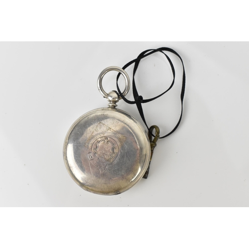 107 - A Victorian silver open faced pocket watch having an ornate silvered engraved dial with gilt highlig... 