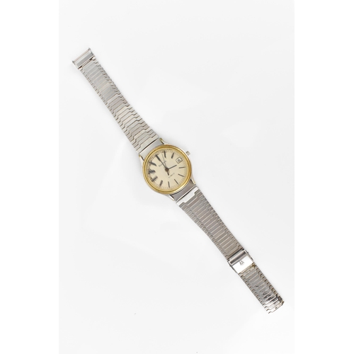 74 - A Bulova quartz, gents stainless steel wristwatch, circa 1979 having a silvered dial with centre sec... 