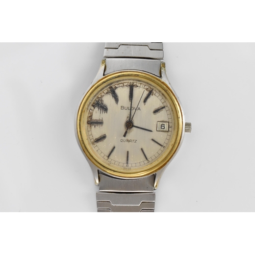 74 - A Bulova quartz, gents stainless steel wristwatch, circa 1979 having a silvered dial with centre sec... 