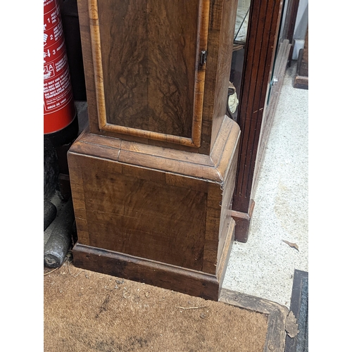 78 - An early 18th century and later walnut veneered longcase clock, the gilt dial signed 'Daniel Parker ... 