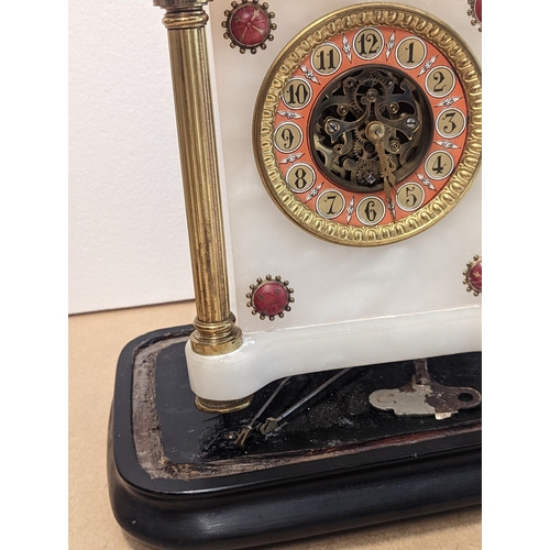 89 - A 19th century French white marble mantle clock with glass dome, the case decorated with gilt lion t... 