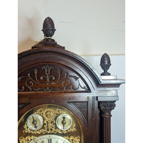 93 - An early 20th century directors style clock by Winterhalder & Hofmeier, the arched top mahogany case... 