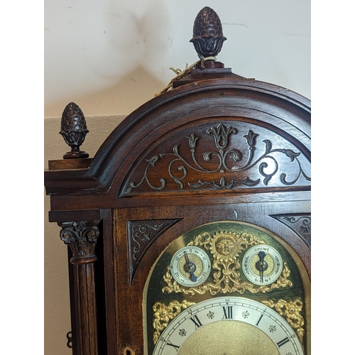 93 - An early 20th century directors style clock by Winterhalder & Hofmeier, the arched top mahogany case... 