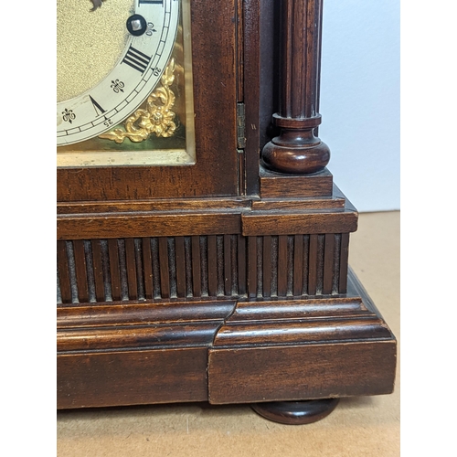 93 - An early 20th century directors style clock by Winterhalder & Hofmeier, the arched top mahogany case... 