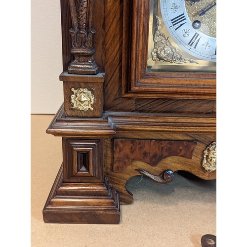 94 - A late 19th century Reinhold Schnekenburger bracket clock with wall hanging bracket, the mixed wood ... 