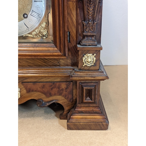 94 - A late 19th century Reinhold Schnekenburger bracket clock with wall hanging bracket, the mixed wood ... 