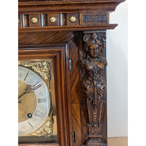 94 - A late 19th century Reinhold Schnekenburger bracket clock with wall hanging bracket, the mixed wood ... 