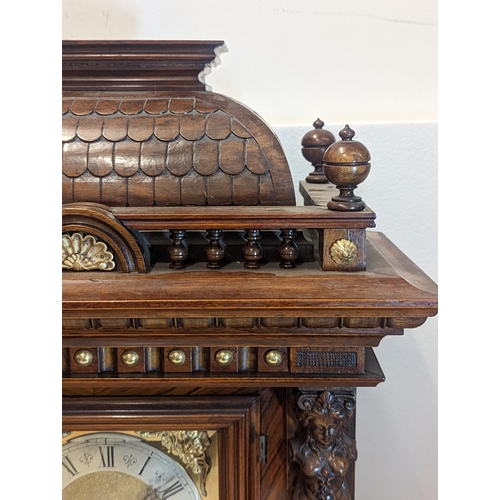 94 - A late 19th century Reinhold Schnekenburger bracket clock with wall hanging bracket, the mixed wood ... 