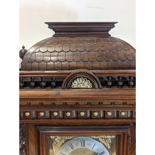 94 - A late 19th century Reinhold Schnekenburger bracket clock with wall hanging bracket, the mixed wood ... 