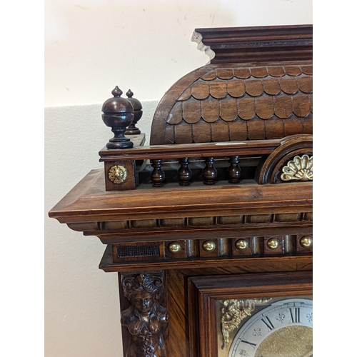 94 - A late 19th century Reinhold Schnekenburger bracket clock with wall hanging bracket, the mixed wood ... 