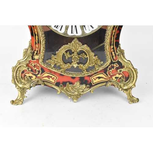 75 - A 20th century French boulle work mantle clock having applied gilt metal C scroll and floral mounts ... 