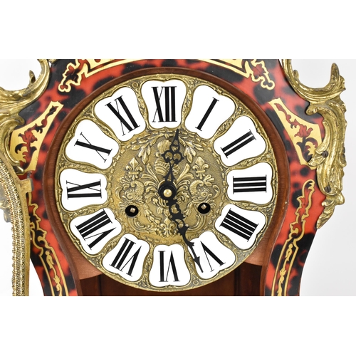 75 - A 20th century French boulle work mantle clock having applied gilt metal C scroll and floral mounts ... 