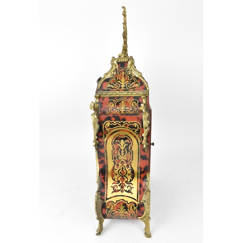 75 - A 20th century French boulle work mantle clock having applied gilt metal C scroll and floral mounts ... 