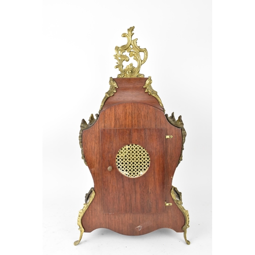 75 - A 20th century French boulle work mantle clock having applied gilt metal C scroll and floral mounts ... 