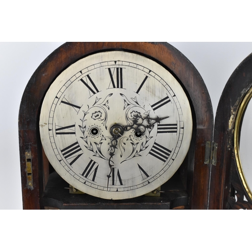 76 - An early Victorian coromandel mantle clock, the silvered dial having a floral engraved centre with R... 