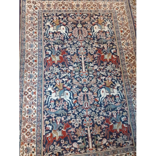 120 - A blue ground rug, 126cm x 183cm, having the Tree of Life design
Location: A2B