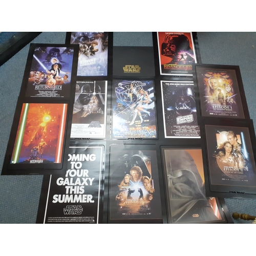 278 - Two folios of Star Wars Classic Movie Posters, 24 in total, 42cm x 30cm, together with a Morphing li... 