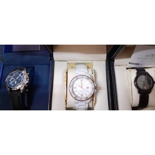 283 - Three modern Klaus Kobec watches and a Nautical Time watch, all in original boxes Location: R1.2