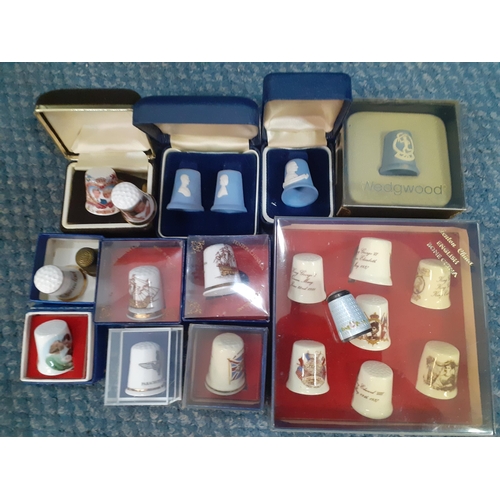 301 - Commemorative items to include Wedgwood blue Jasperware trinket dishes, together with mixed thimbles... 