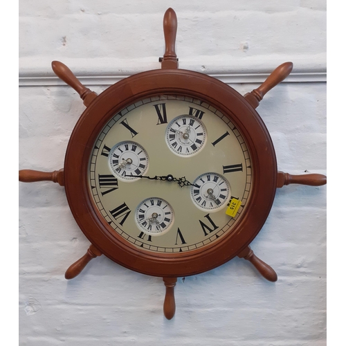 315 - A modern wall clock in the nautical style with four time zones
Location: RWB