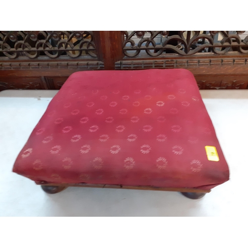 78 - A low foot stool with bun feet and red upholstered top, 47cm x 47cm
Location: RWF