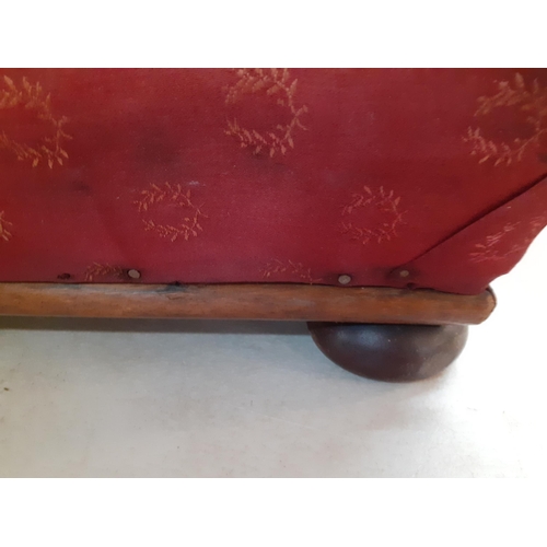 78 - A low foot stool with bun feet and red upholstered top, 47cm x 47cm
Location: RWF