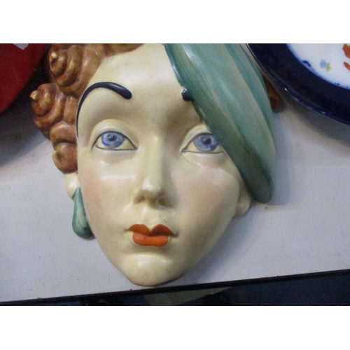 248 - Beswick wall hanging face mask and a group of ashtrays and Continental porcelain plates and a bowl L... 