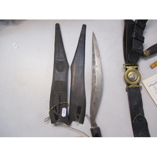 250 - A mixed lot to include a WWII British fighting knife, Philippines dagger 'bolo knife', a WWII era Ja... 