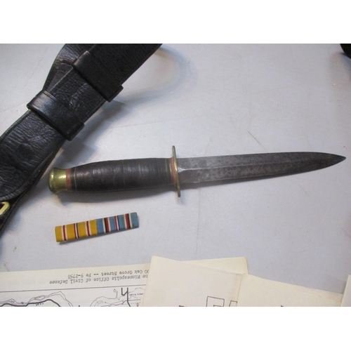 250 - A mixed lot to include a WWII British fighting knife, Philippines dagger 'bolo knife', a WWII era Ja... 