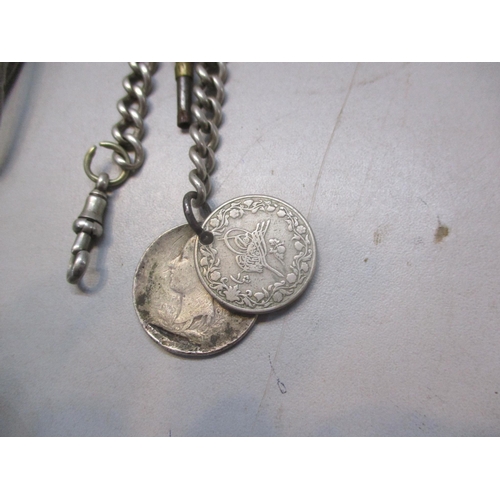 257 - A silver cased pocket watch, two silver pocket watch chains and three silver handled button hooks
Lo... 