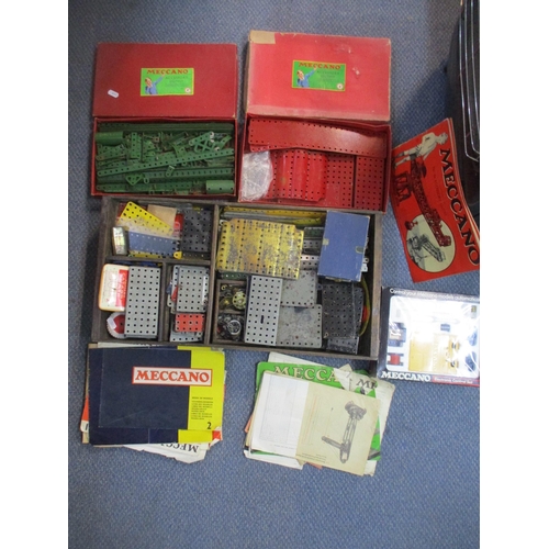 145 - A selection of Meccano to include clockwork motors, box Electronic control set, mixed leaflets, and ... 