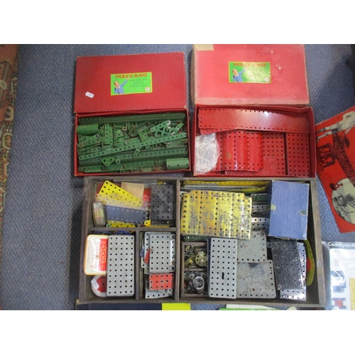 145 - A selection of Meccano to include clockwork motors, box Electronic control set, mixed leaflets, and ... 