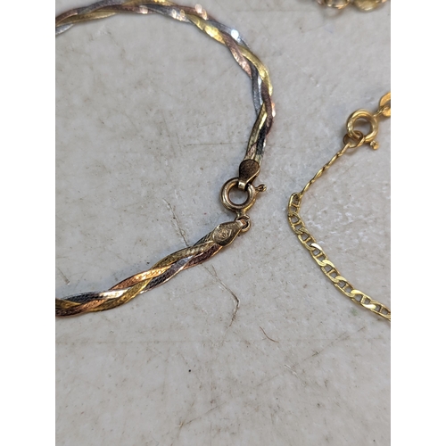 183 - Three 9ct gold bracelets to include a tri-colour example in a twisted design, along with one other b... 