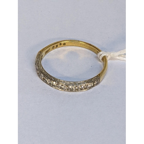 10 - An 18ct gold half eternity ring set with diamond, 2.7g
Location: RING