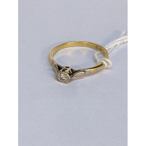 11 - An 18ct gold ring with an illusion set diamond, weight g
Location: RING