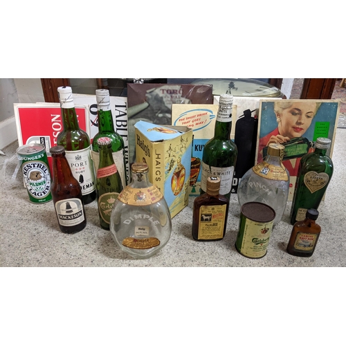 112 - Advertising related items to include whisky bottle, a Carlsberg tin, Dimple whisky and signs
Locatio... 