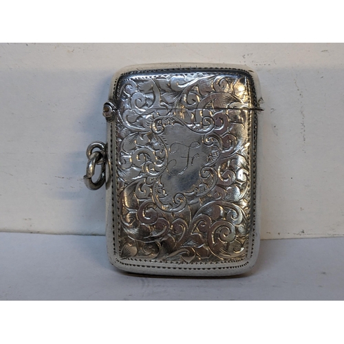 222 - An early 20th century silver engraved vesta case, hallmarked Birmingham 1903, 23.8g
Location: CAB2